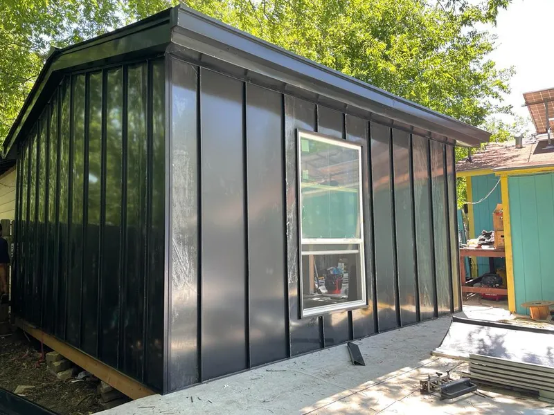 Black standing seam metal wall panels for Metal Roof Installation in Haverhill