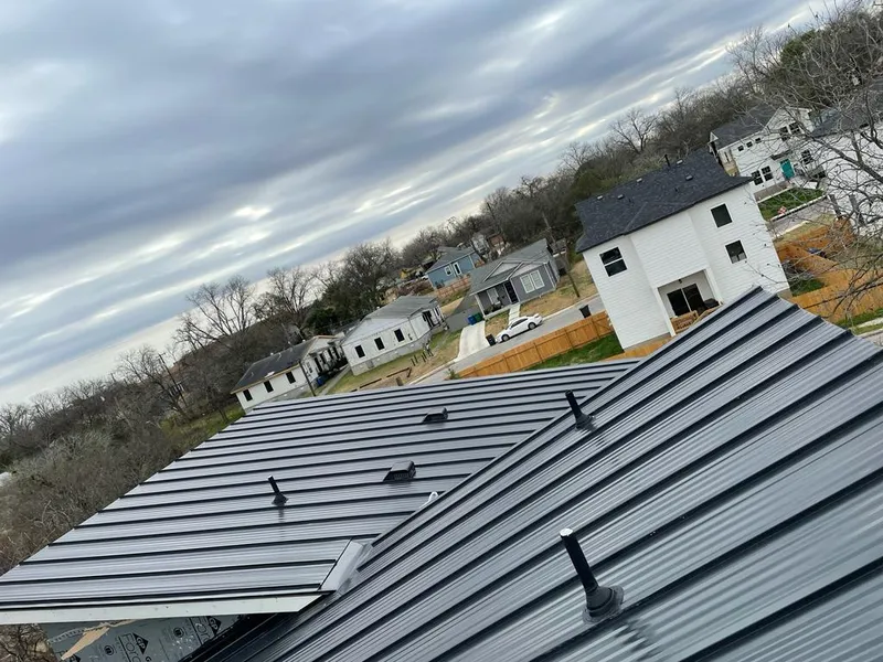 Standing seam metal roof panels with vents for Skylight Repair in Haverhill